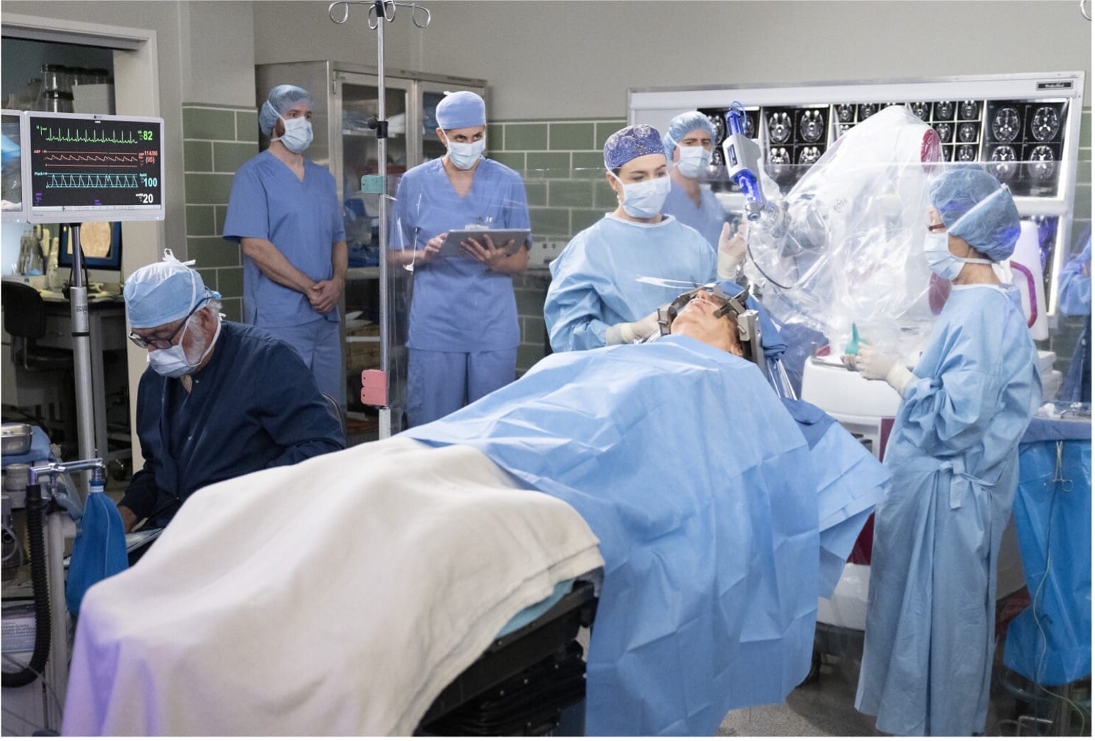 Doctors performing a complicated surgery in hospital.