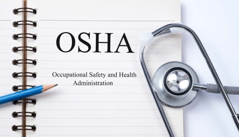 OSHA notebook with stethoscope and pencil