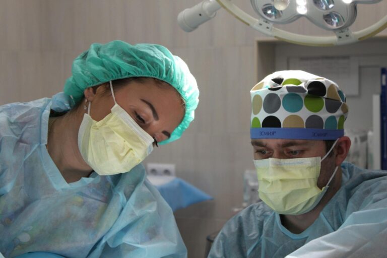 Surgeons focused during an operation in hospital.