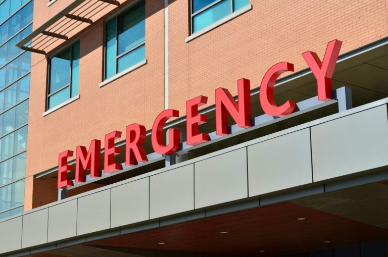 Emergency department entrance sign on building