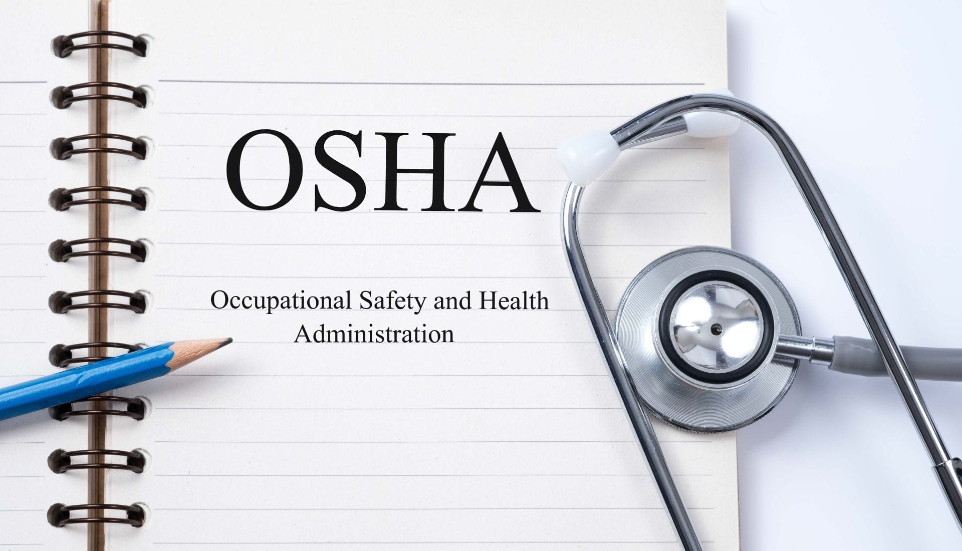 OSHA notebook with stethoscope and pencil