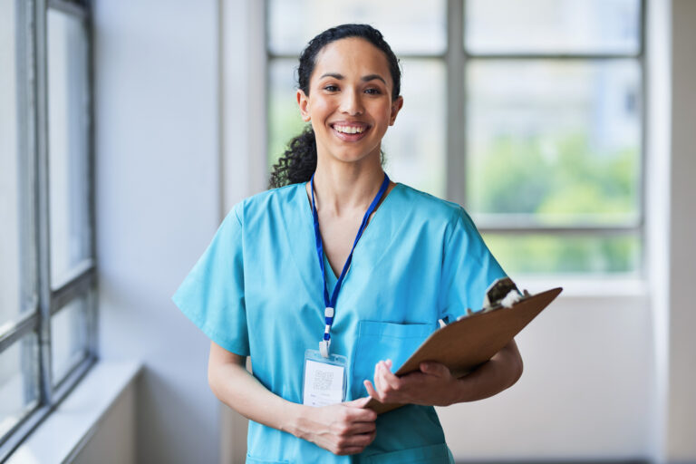 Medical professional holding a clipboard with a medical waste compliance checklist.